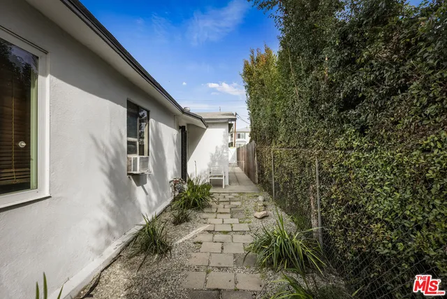 a house with trees in front of it