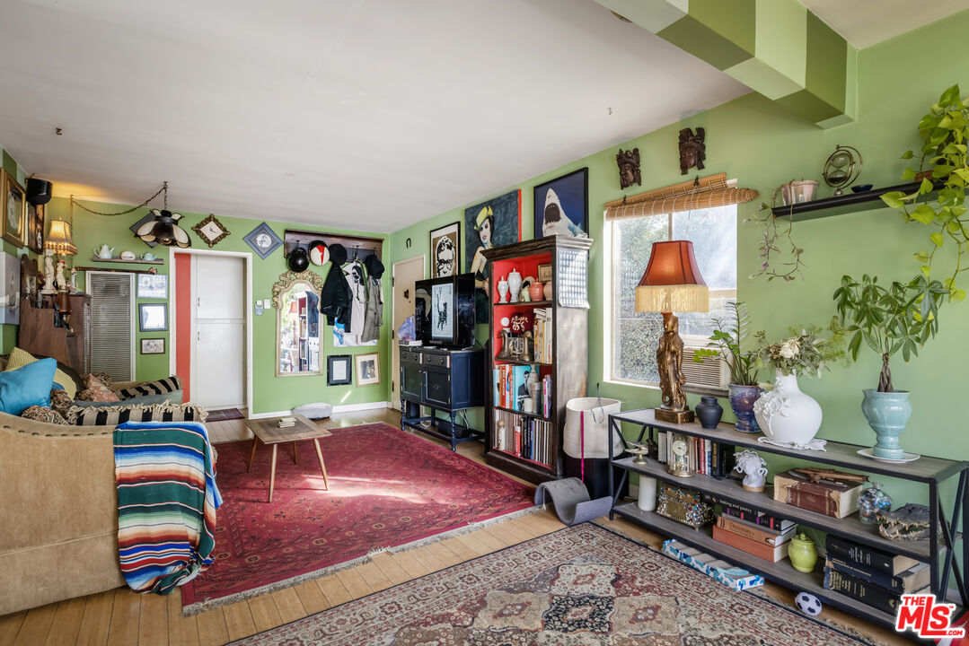 2912 Bellevue Avenue Los Angeles, CA 90026 - Photo 14 of 38 a living room with furniture and wooden floor