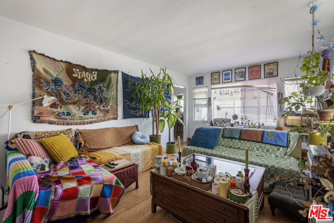 2912 Bellevue Avenue Los Angeles, CA 90026 - Photo 26 of 38 a living room with furniture and a potted plant