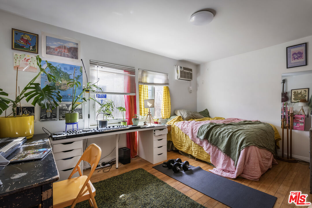 2912 Bellevue Avenue Los Angeles, CA 90026 - Photo 34 of 38 a bedroom with a bed and furniture