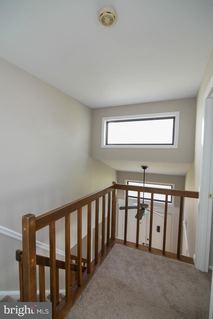 7820 Marconi Court Springfield, VA 22153 - Photo 16 of 29 a view of staircase with rug