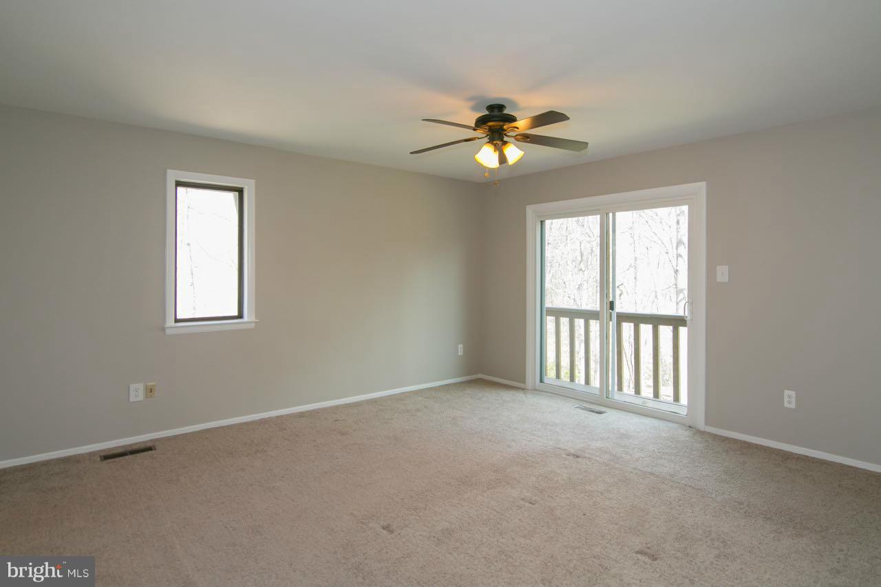 7820 Marconi Court Springfield, VA 22153 - Photo 18 of 29 a view of an empty room with a window