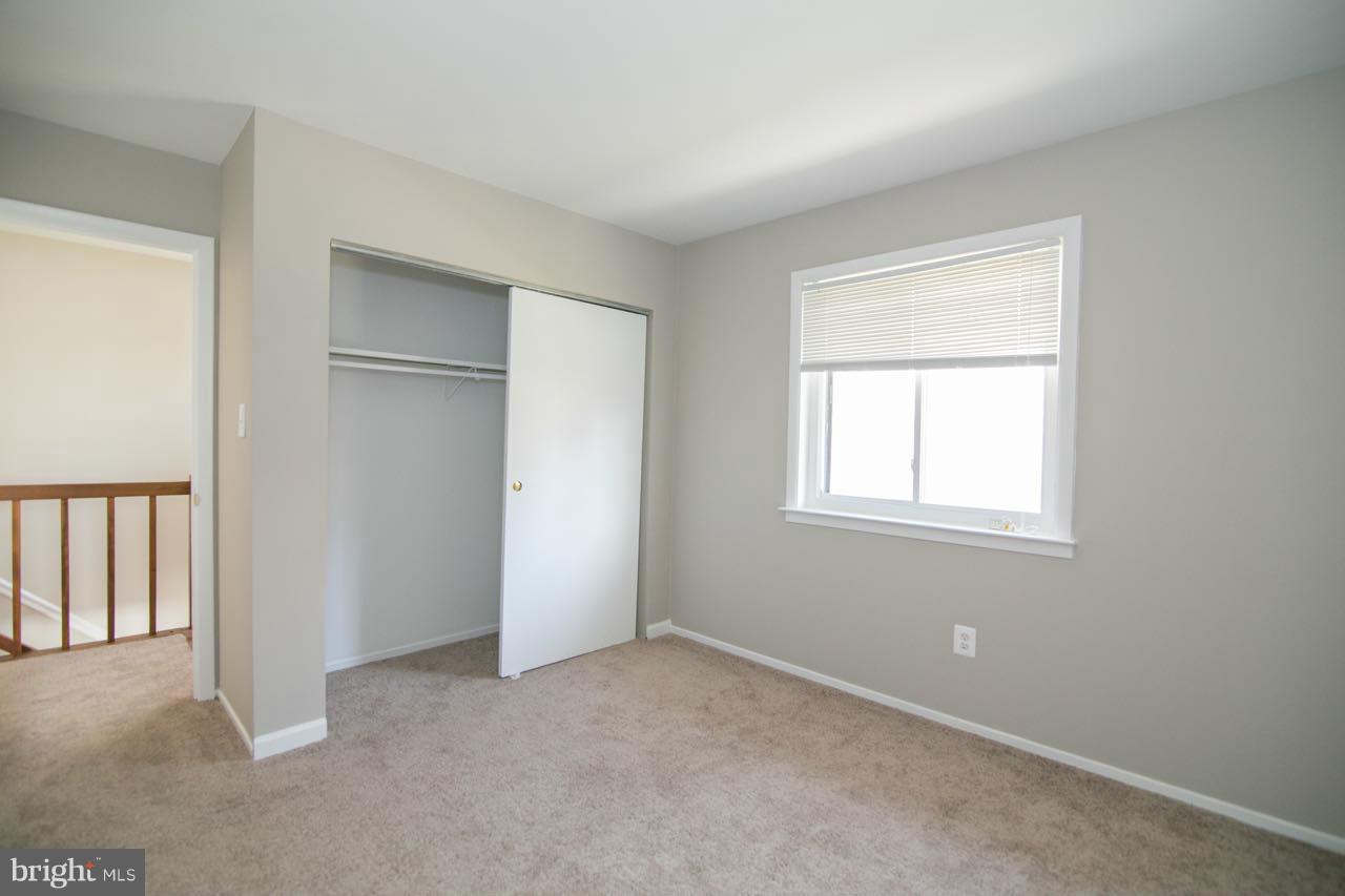 7820 Marconi Court Springfield, VA 22153 - Photo 20 of 29 an empty room with windows and closet