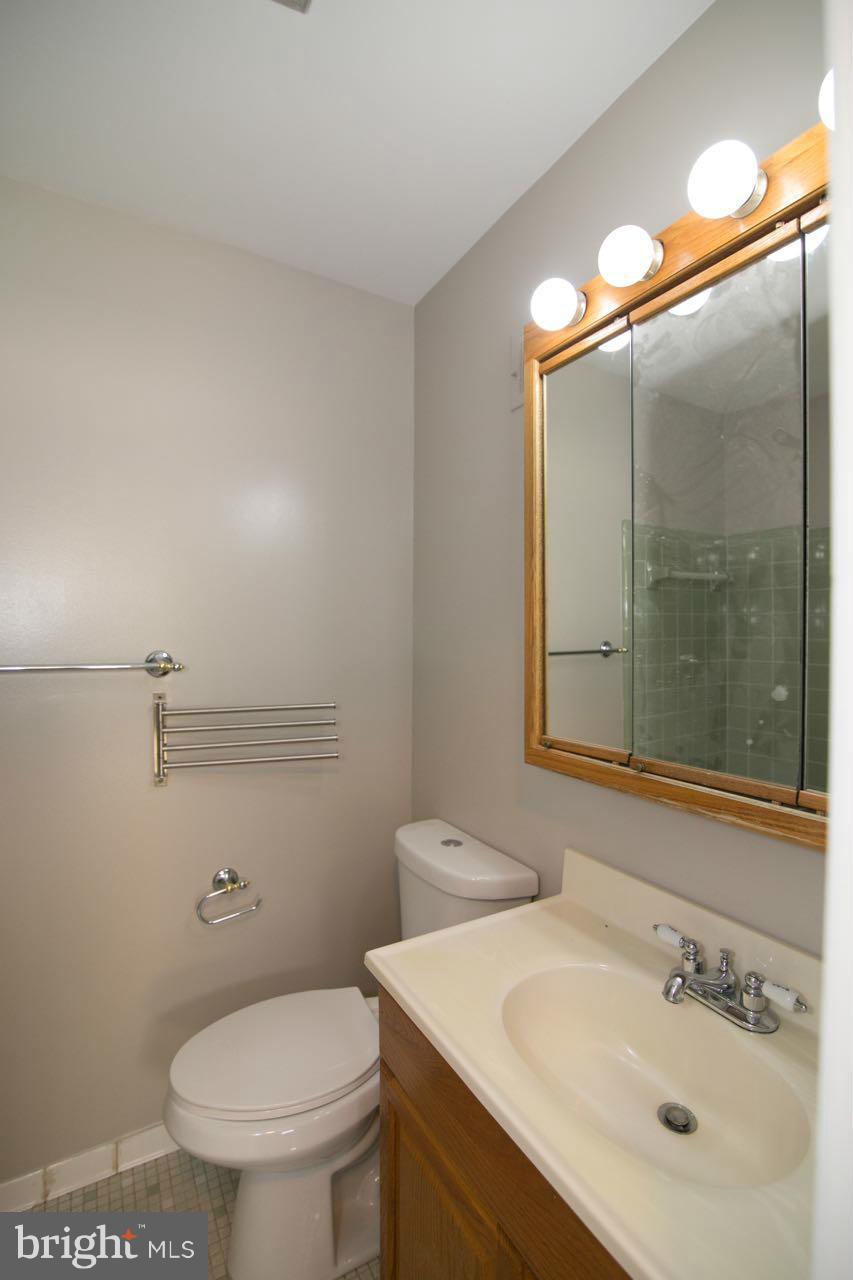 7820 Marconi Court Springfield, VA 22153 - Photo 21 of 29 a bathroom with a sink toilet and shower
