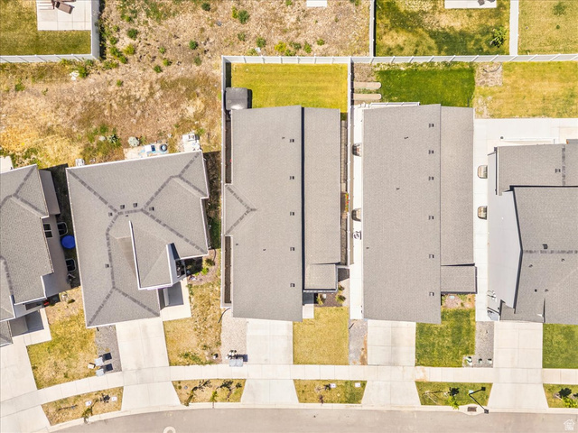 3916 South Sage Wood Avenue Mapleton, UT 84664 - Photo 32 of 33 Aerial perspective showcasing multiple residential properties with grey shingle roofs