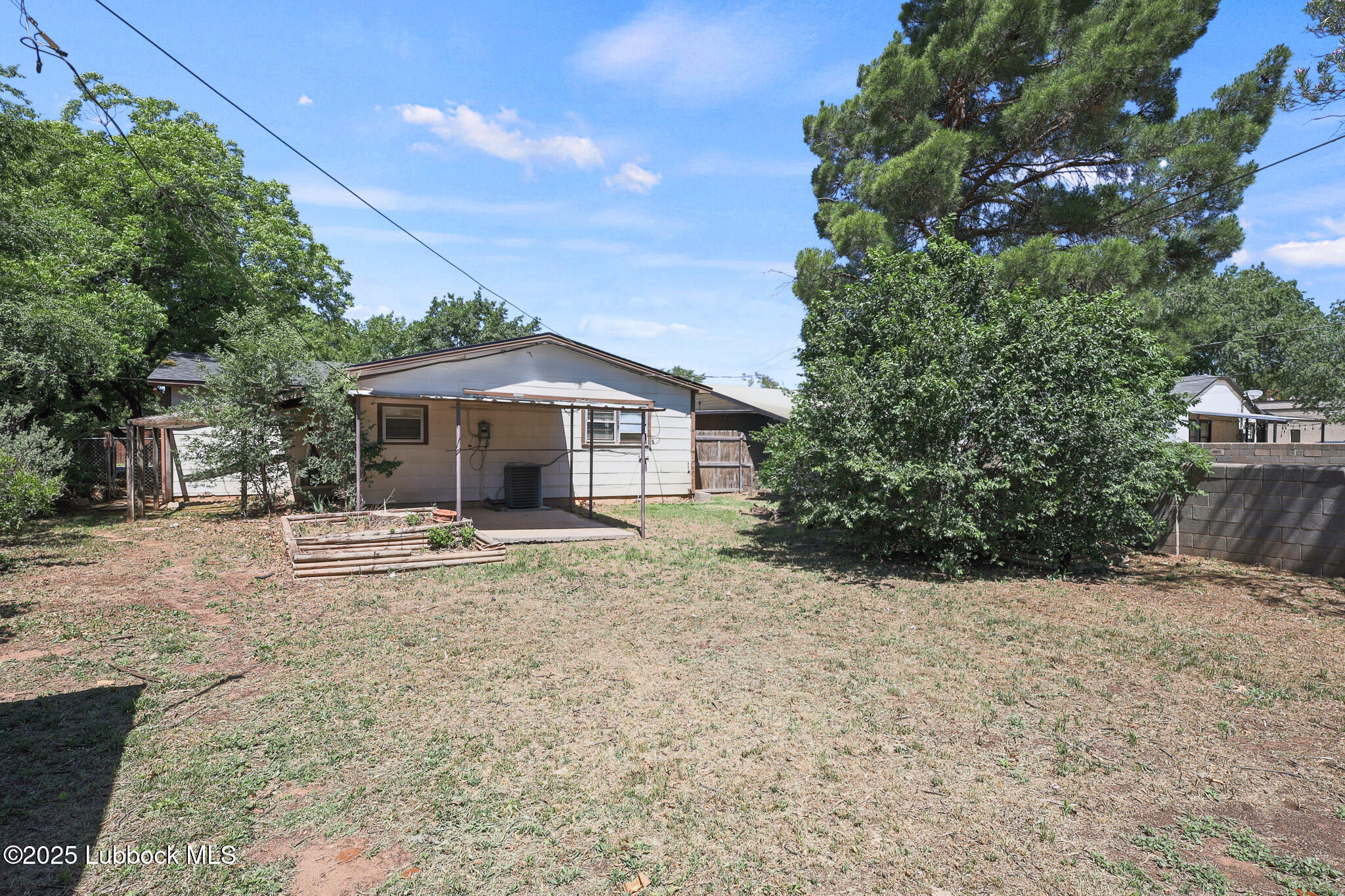 2315 Ithaca Avenue Lubbock, TX 79410 - Photo 28 of 30 a house with trees in the background