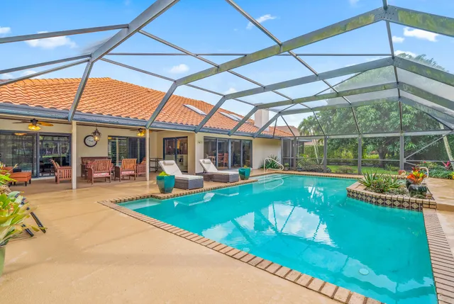 a view of a house with swimming pool