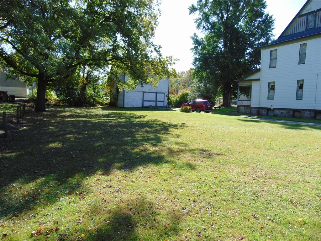 201 Main Street Dawson, PA 15428 - Photo 6 of 25 a view of a house with a yard