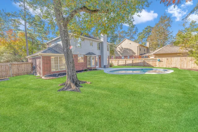 a house with garden in front of it