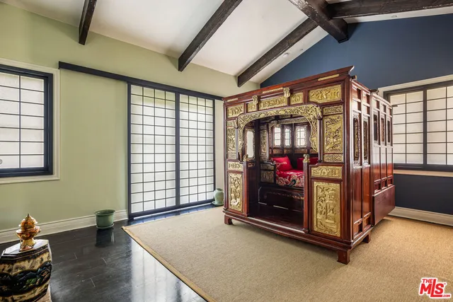 a view of a livingroom with furniture and a fireplace