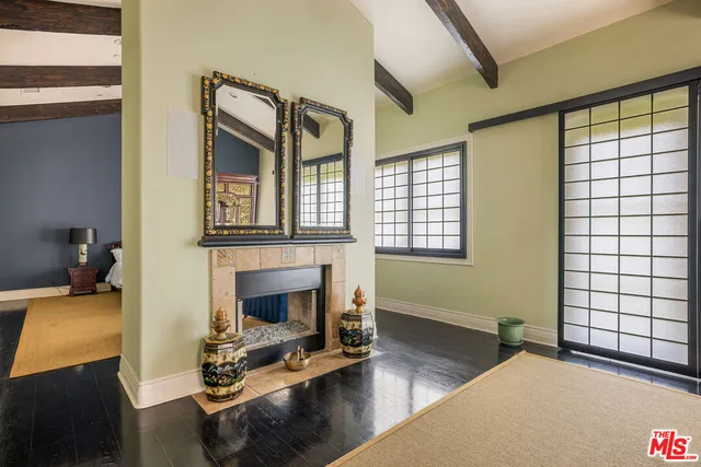 a bathroom with a double vanity sink mirror and shower