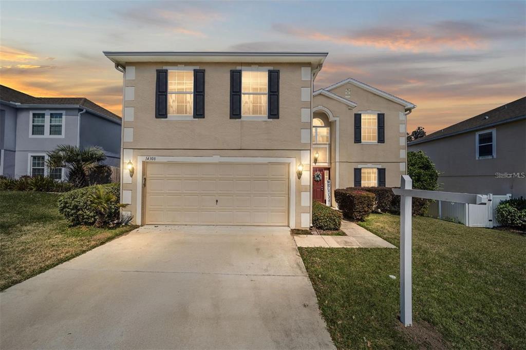 14308 Northwest 161st Avenue Alachua, FL 32615 - Photo 2 of 52 front view of house with a yard
