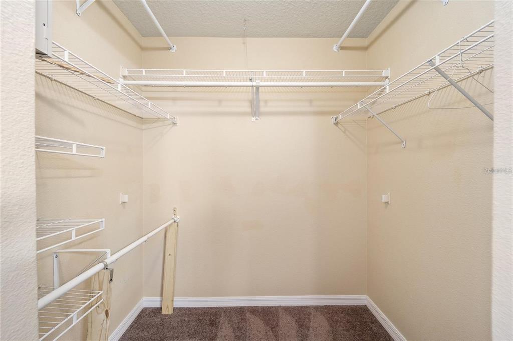 14308 Northwest 161st Avenue Alachua, FL 32615 - Photo 21 of 52 a view of a room with racks on the wall