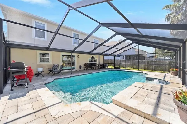 a view of a swimming pool with a garden