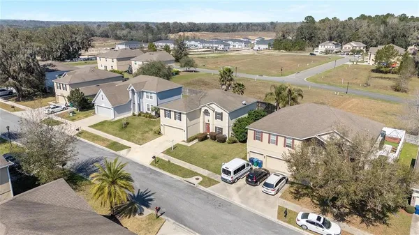 an aerial view of a house with a garden