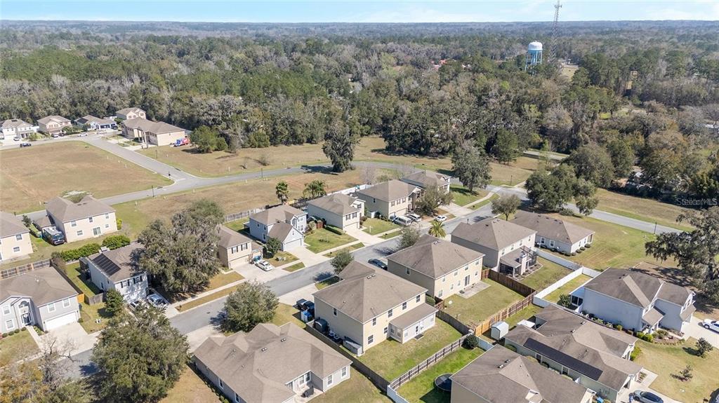 14308 Northwest 161st Avenue Alachua, FL 32615 - Photo 44 of 52 an aerial view of a city with lots of residential buildings