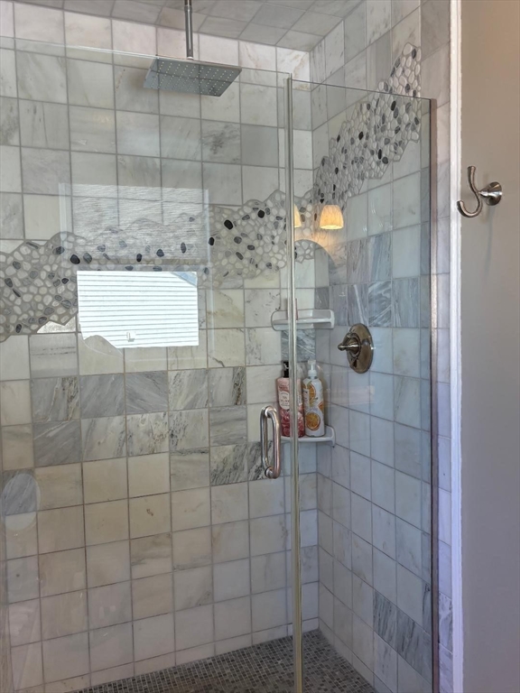 9 Endicott Street, Unit B Danvers, MA 01923 - Photo 17 of 42 a bathroom with a shower