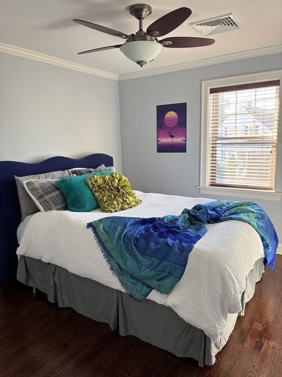 9 Endicott Street, Unit B Danvers, MA 01923 - Photo 19 of 42 a bedroom with a bed and wooden floor