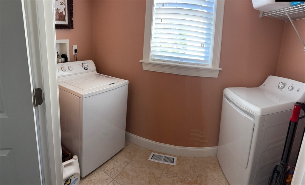 9 Endicott Street, Unit B Danvers, MA 01923 - Photo 23 of 42 a utility room with dryer and washer
