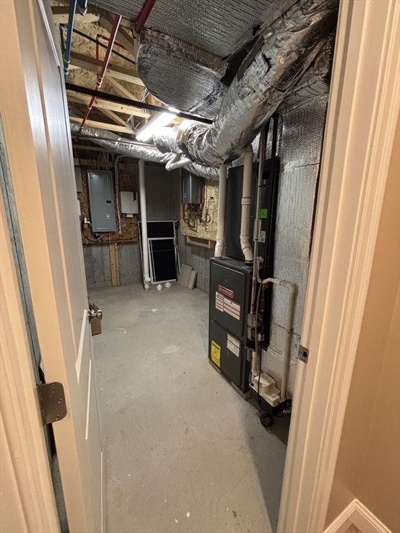 9 Endicott Street, Unit B Danvers, MA 01923 - Photo 32 of 42 a view of storage and utility room