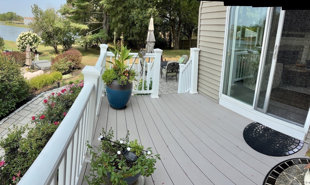 9 Endicott Street, Unit B Danvers, MA 01923 - Photo 34 of 42 a view of a two chair in the balcony