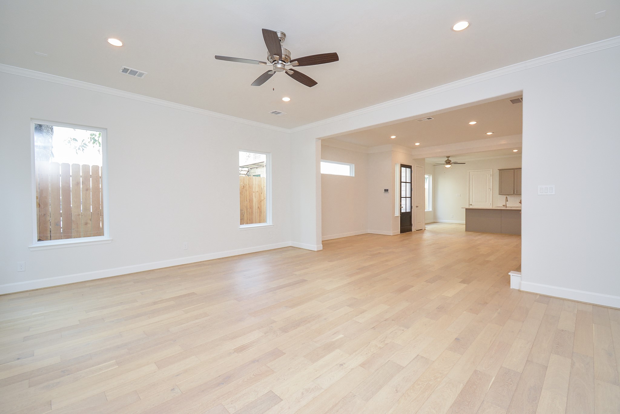 1847 Sul Ross Street Houston, TX 77098 - Photo 16 of 42 an empty room with a ceiling fan and a window