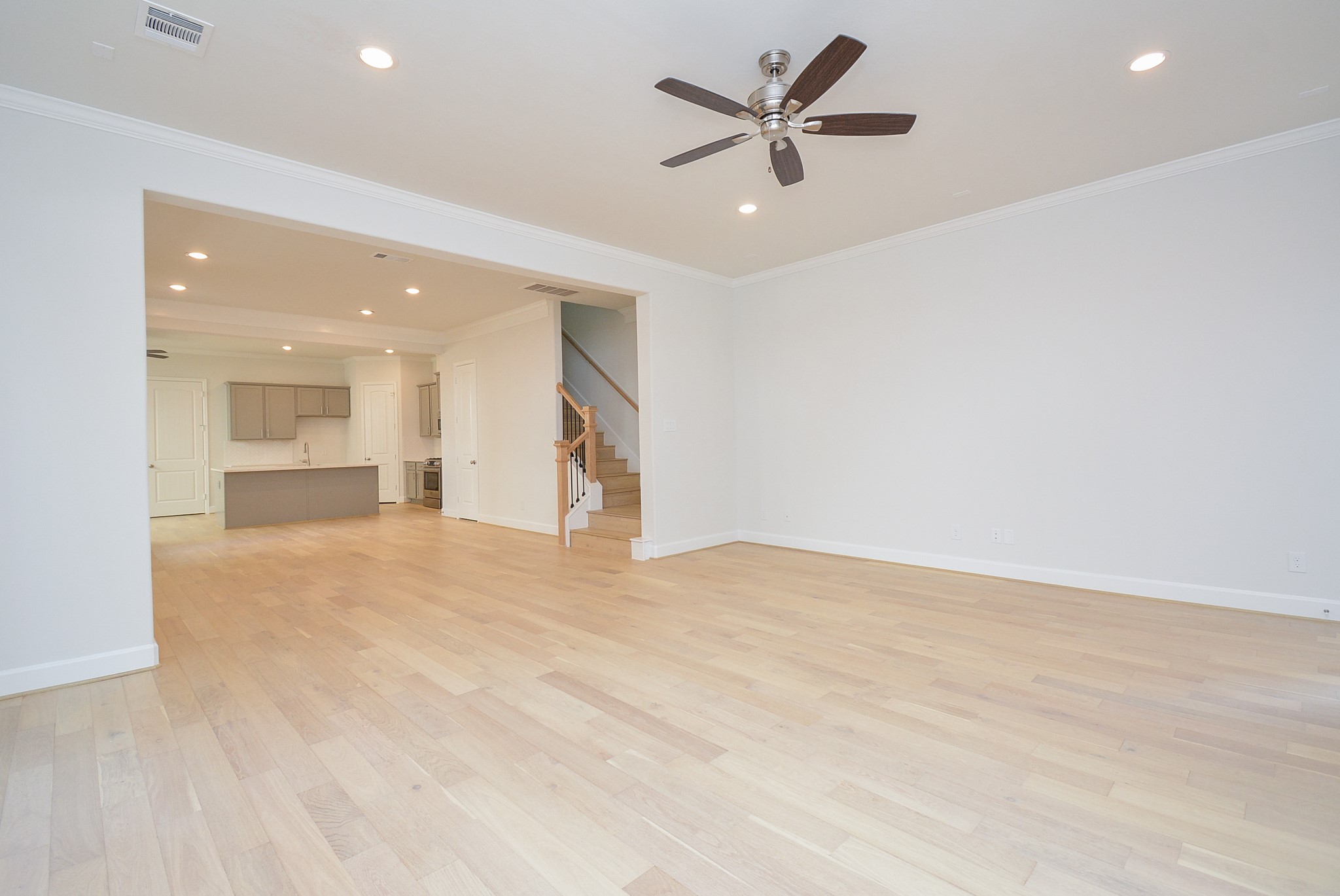 1847 Sul Ross Street Houston, TX 77098 - Photo 17 of 42 an empty room with a empty space and a ceiling fan