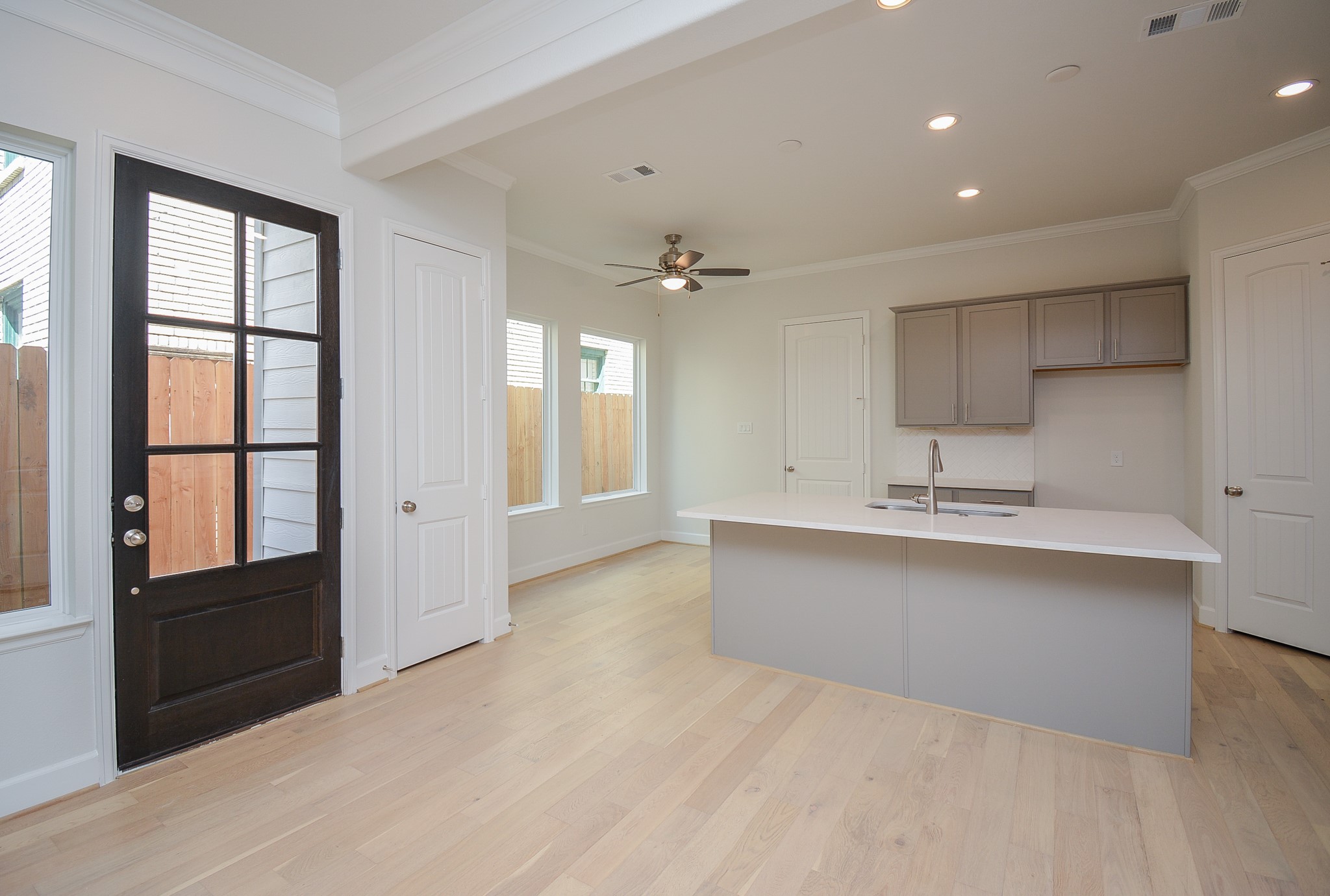 1847 Sul Ross Street Houston, TX 77098 - Photo 2 of 42 a view of living room kitchen with stainless steel appliances granite countertop furniture and a fireplace