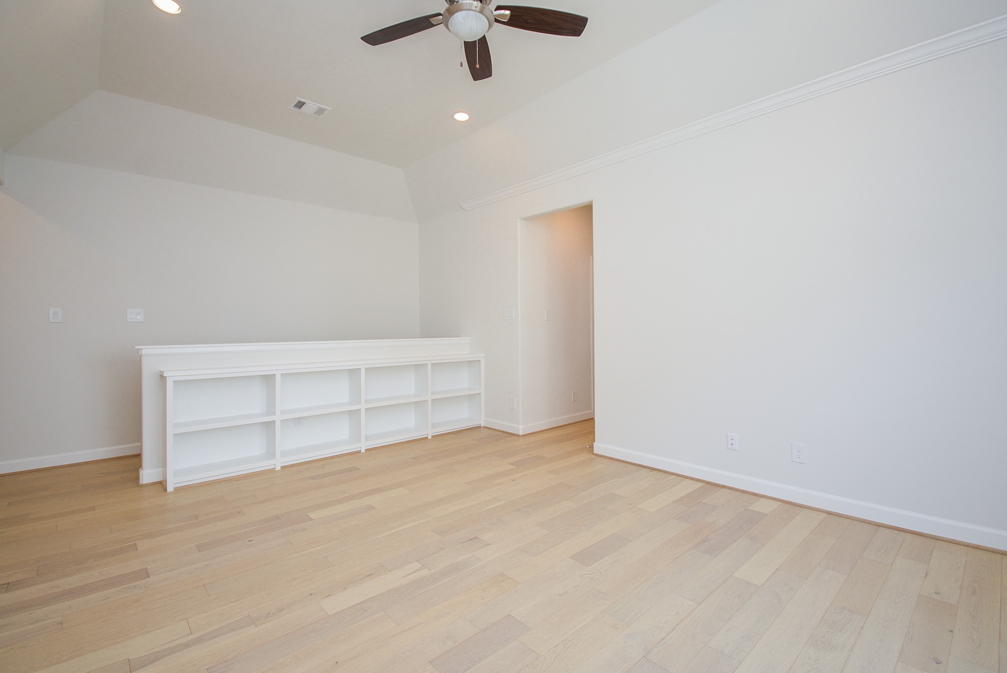 1847 Sul Ross Street Houston, TX 77098 - Photo 27 of 42 an empty room with ceiling fan and window