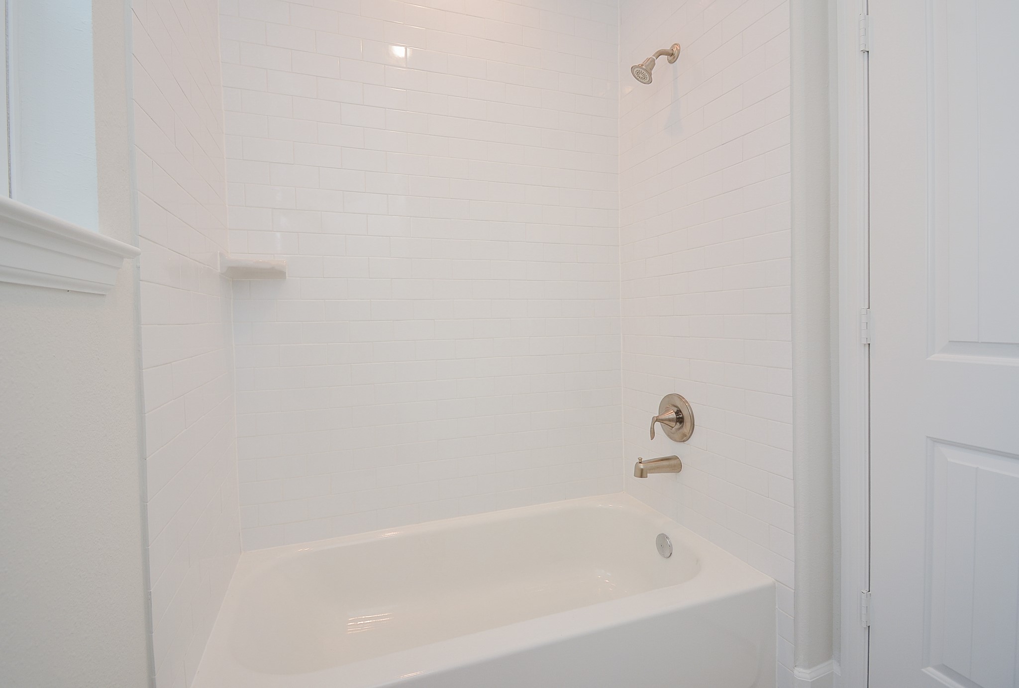 1847 Sul Ross Street Houston, TX 77098 - Photo 39 of 42 a white bath tub sitting next to a white wall