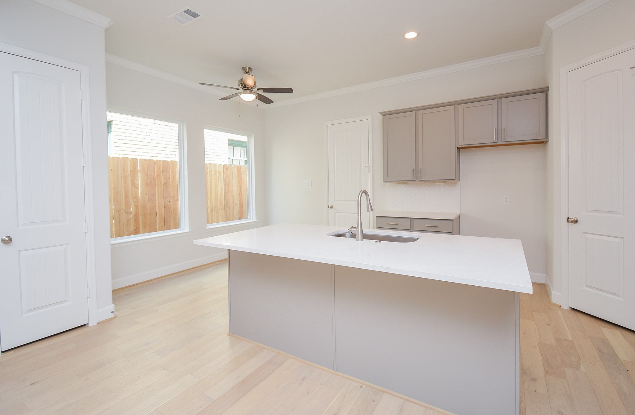 1847 Sul Ross Street Houston, TX 77098 - Photo 4 of 42 a kitchen with a sink cabinets and window