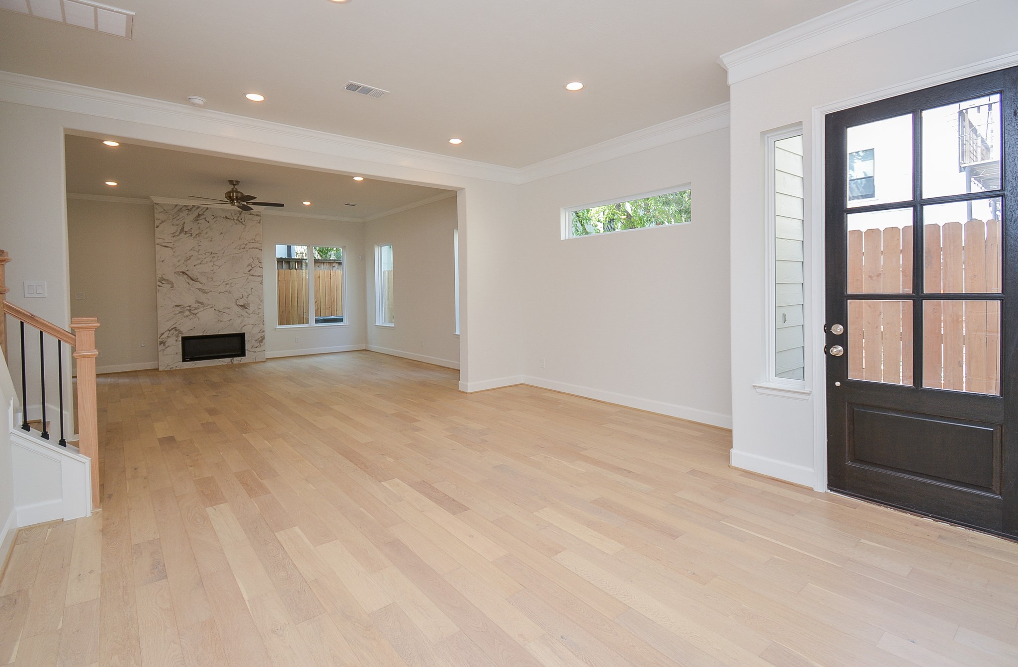 1847 Sul Ross Street Houston, TX 77098 - Photo 9 of 42 an empty room with windows and entrance