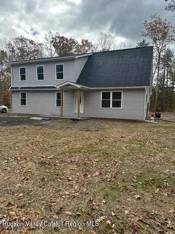 front view of house with a yard