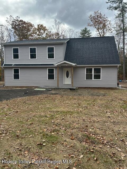 20 Olivers Way Cairo, NY 12413 - Photo 2 of 15 front view of a house with a yard