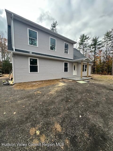 20 Olivers Way Cairo, NY 12413 - Photo 3 of 15 a front view of a house with a yard