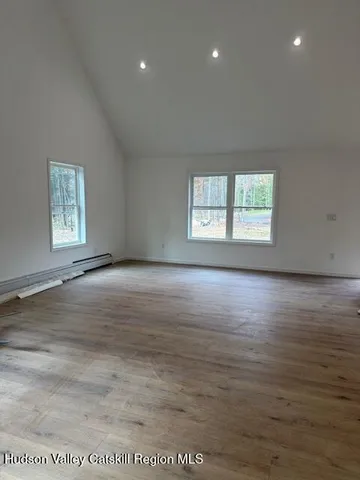 an empty room with windows