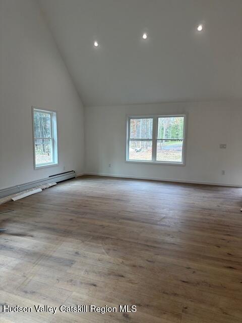 20 Olivers Way Cairo, NY 12413 - Photo 9 of 15 an empty room with wooden floor and windows