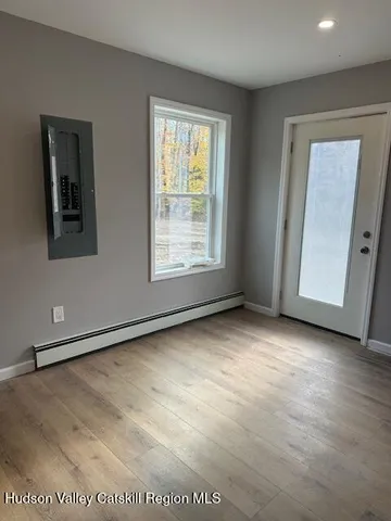 a bathroom with a sink a mirror and vanity