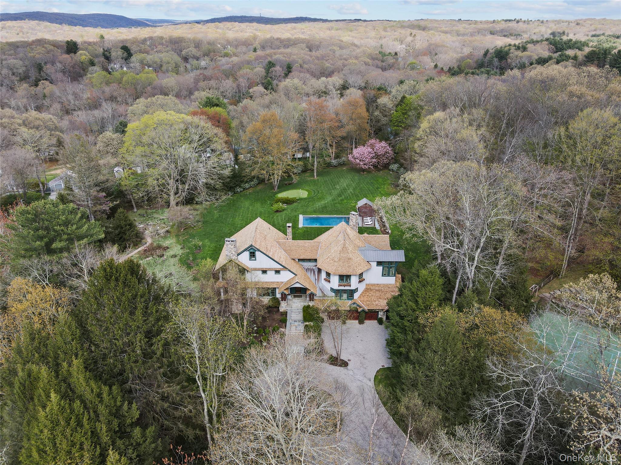 10 Upland Road North Bedford, NY 10506 - Photo 29 of 36 an aerial view of a house with a yard