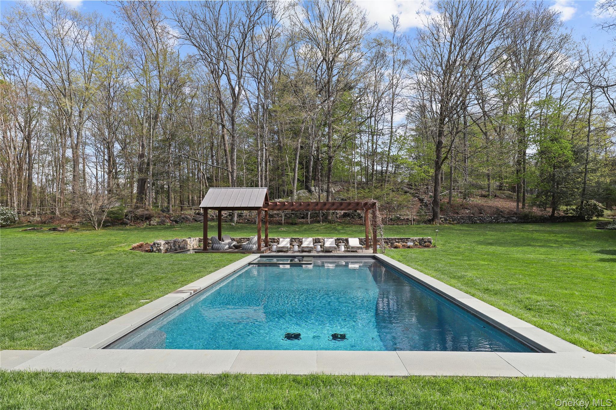 10 Upland Road North Bedford, NY 10506 - Photo 4 of 36 a view of a backyard
