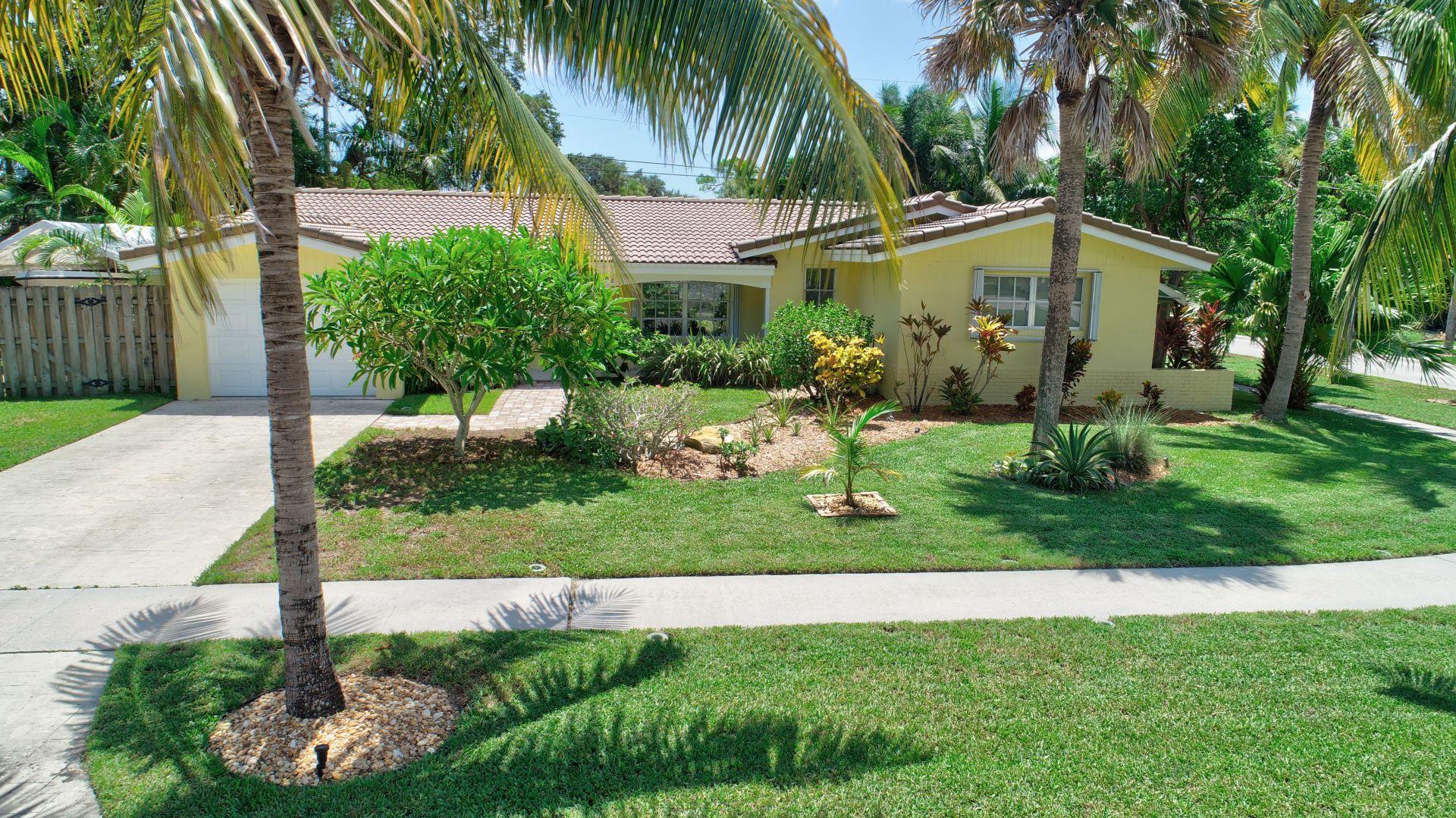 698 Southwest 4th Street Boca Raton, FL 33486 - Photo 1 of 52 Front shot with long driveway