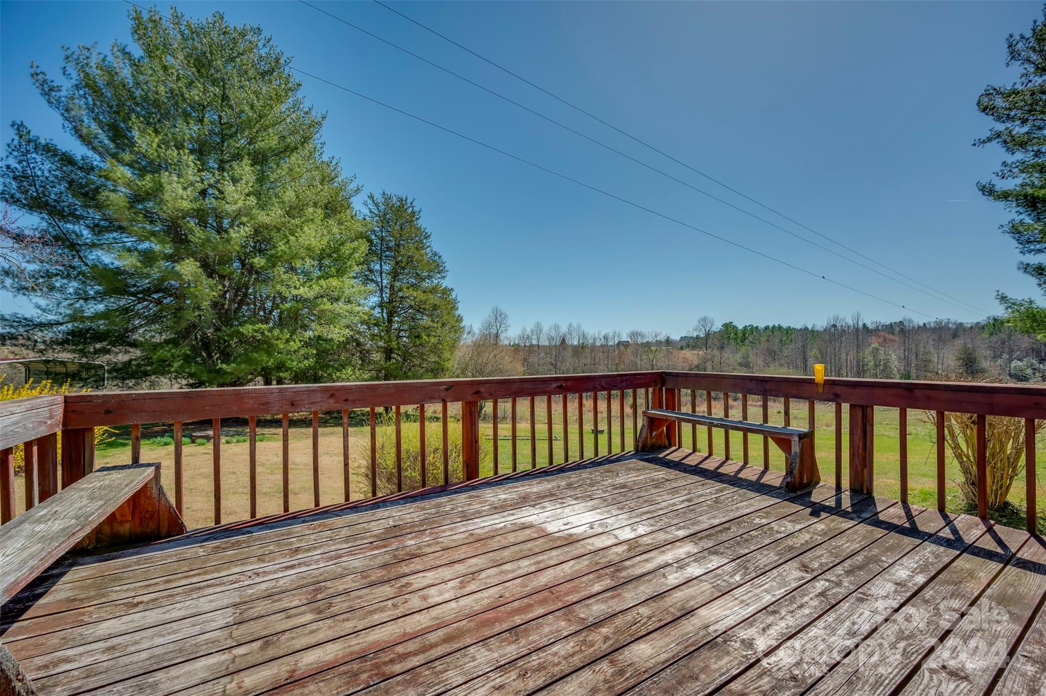 2510 Moore Road Mill Spring, NC 28756 - Photo 27 of 48 a balcony with wooden floor and fence