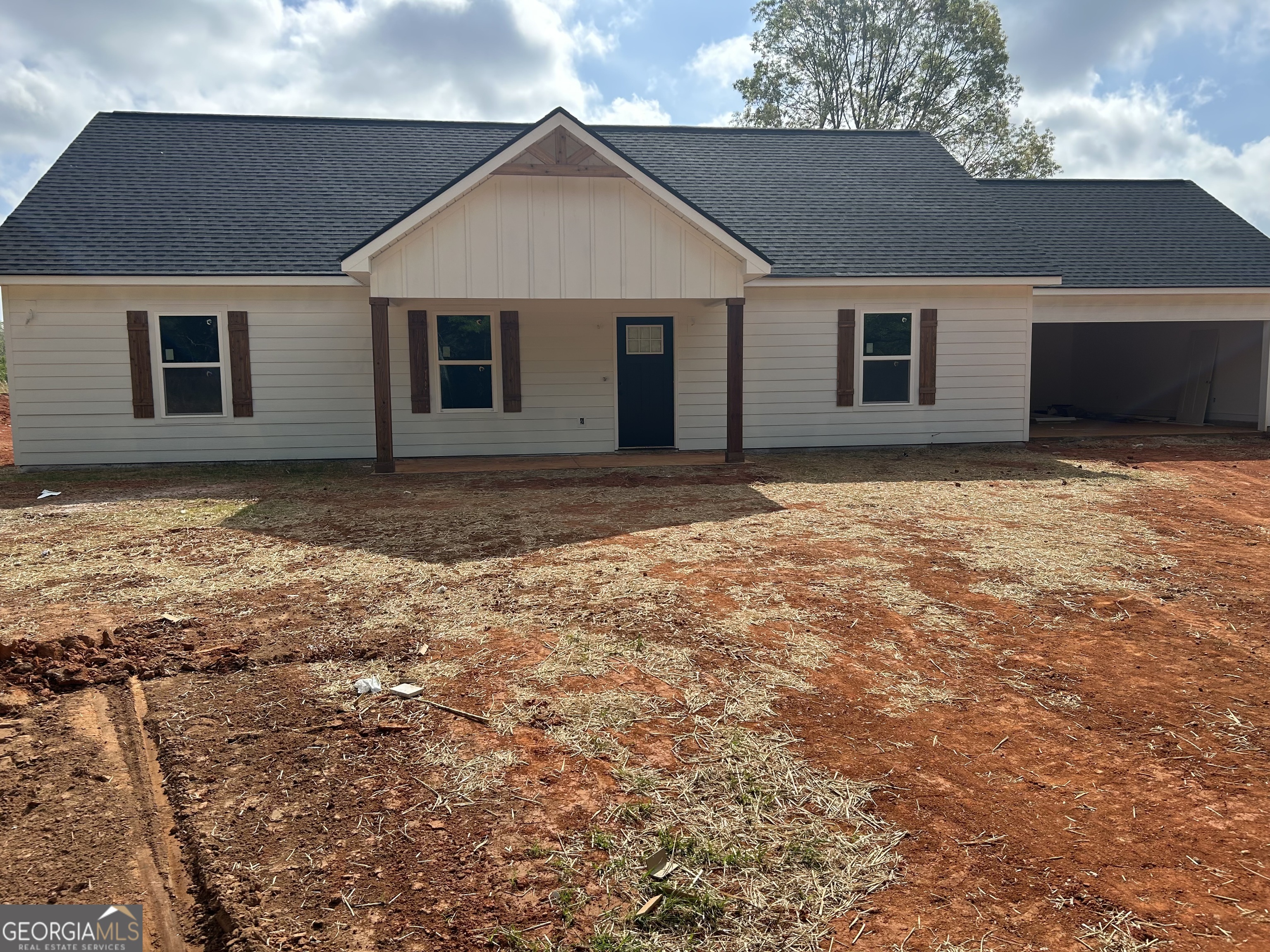 65 Pleasant Grove Road Yatesville, GA 31097 - Photo 3 of 14 a view of a house with a yard