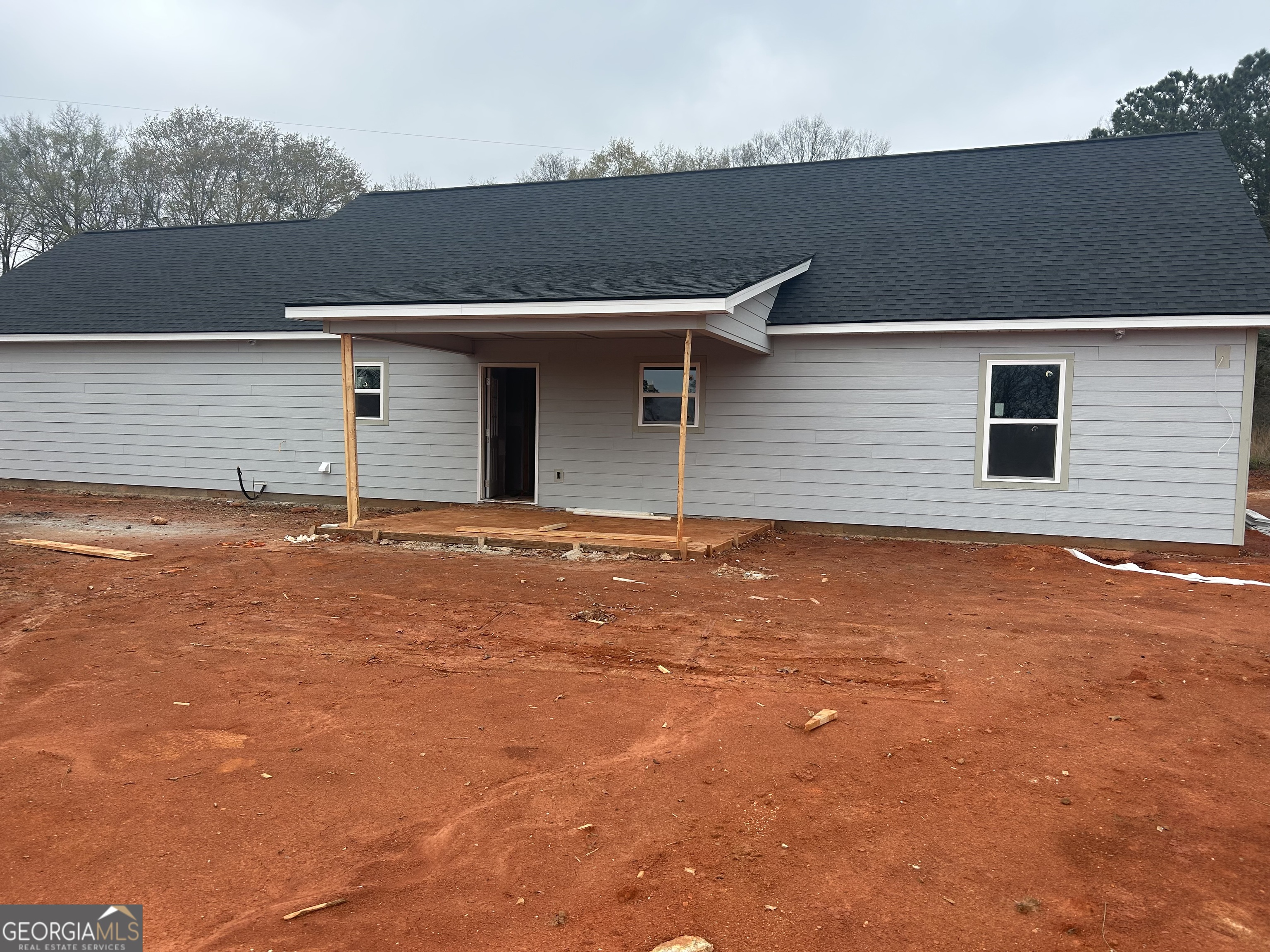 65 Pleasant Grove Road Yatesville, GA 31097 - Photo 5 of 6 a backyard of a house