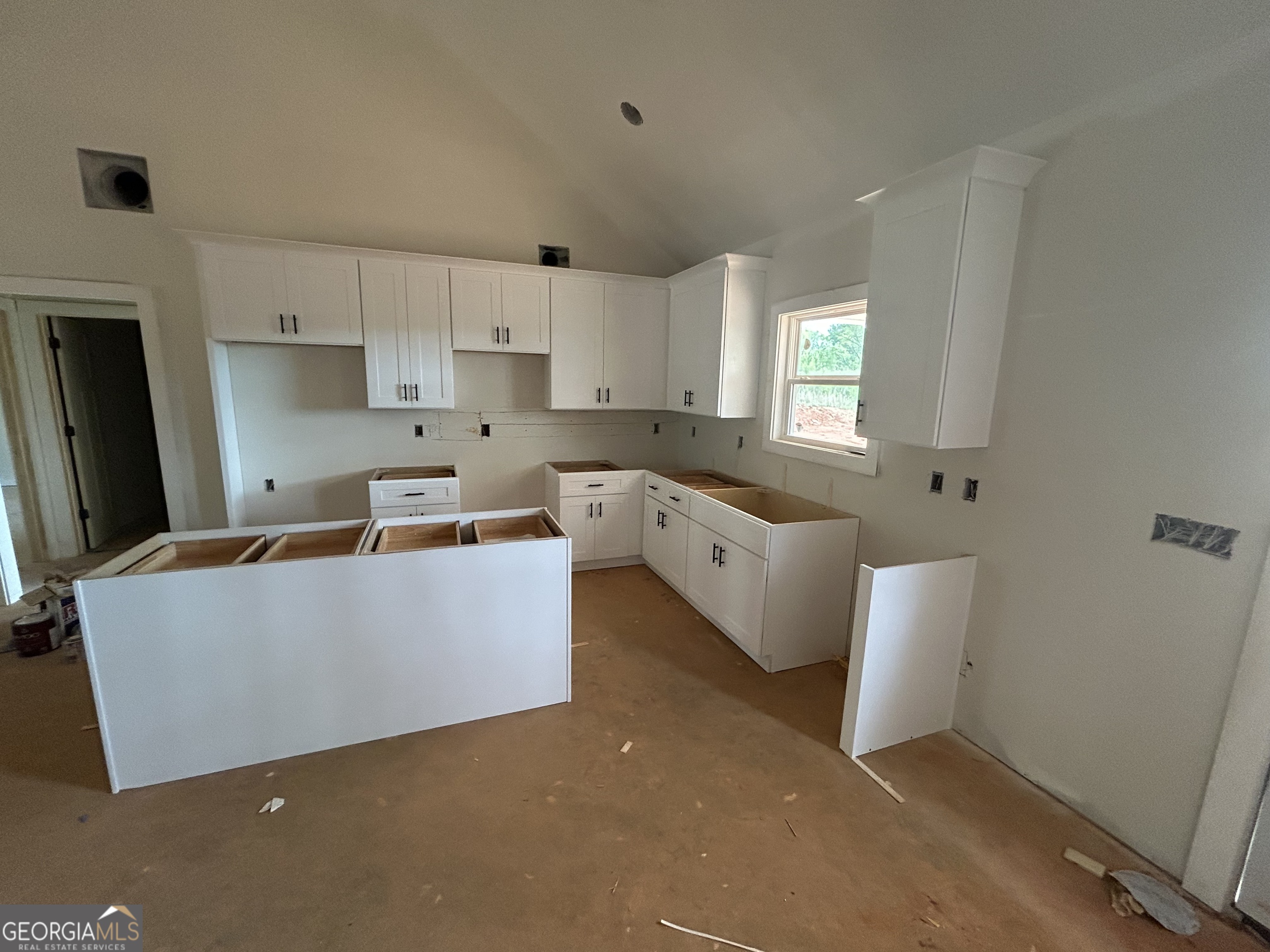 65 Pleasant Grove Road Yatesville, GA 31097 - Photo 10 of 14 a living room with stainless steel appliances furniture and a window