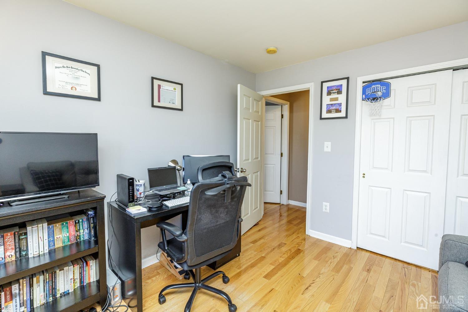 307 Lilac Drive Union, NJ 07083 - Photo 19 of 25 a workspace with furniture and window