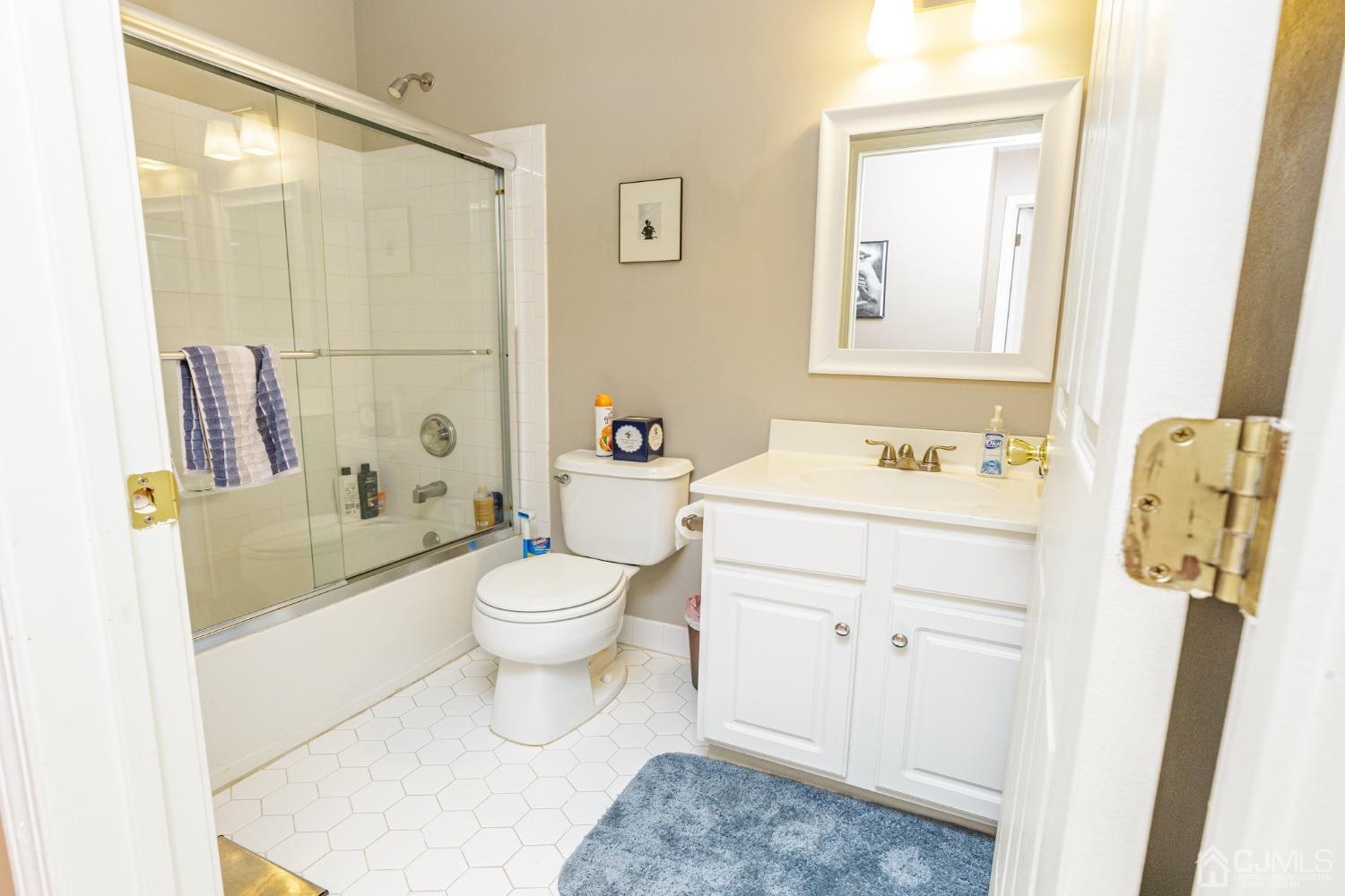 307 Lilac Drive Union, NJ 07083 - Photo 20 of 25 a bathroom with a sink toilet and shower