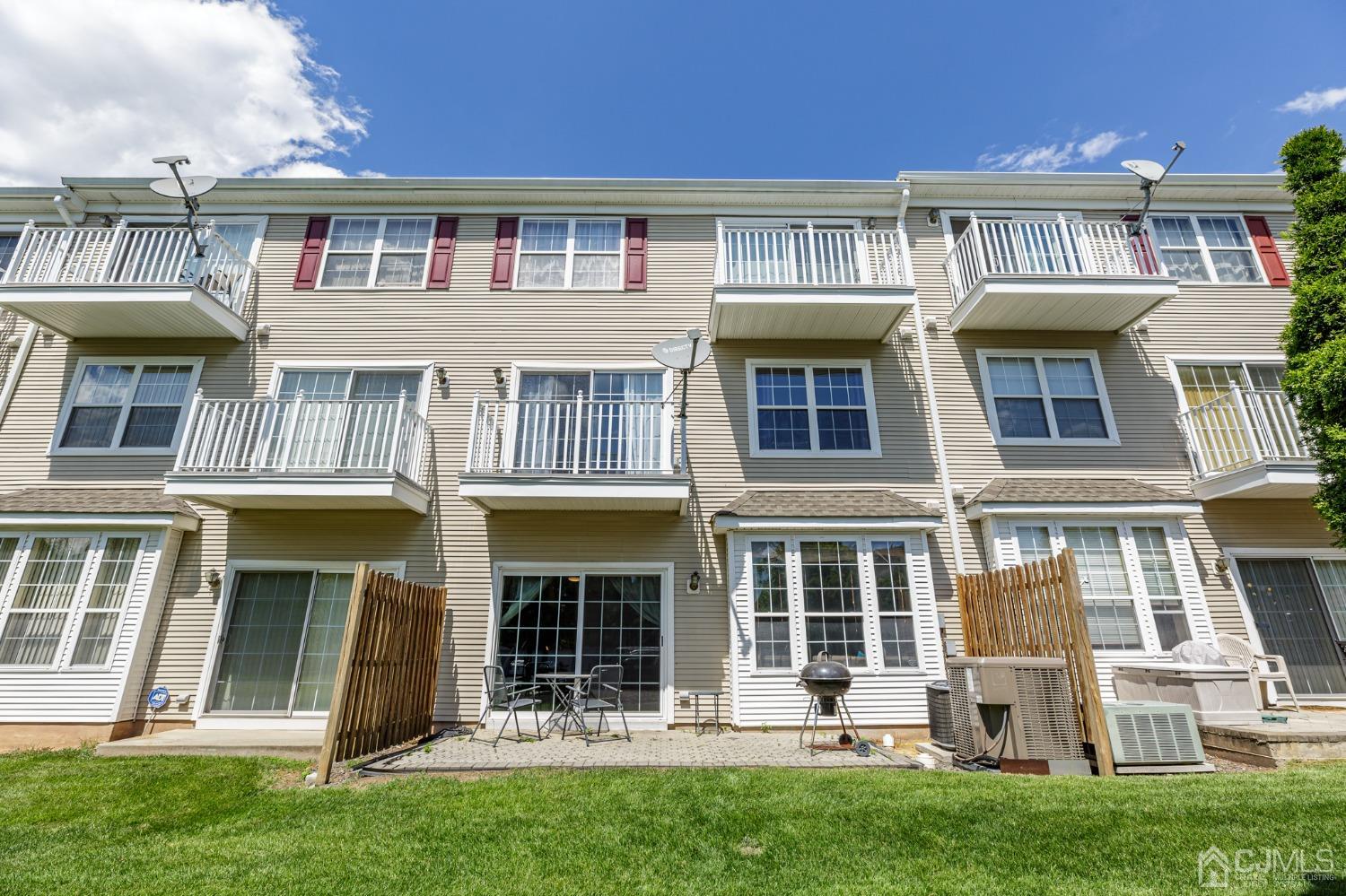307 Lilac Drive Union, NJ 07083 - Photo 22 of 25 front view of a building with a yard