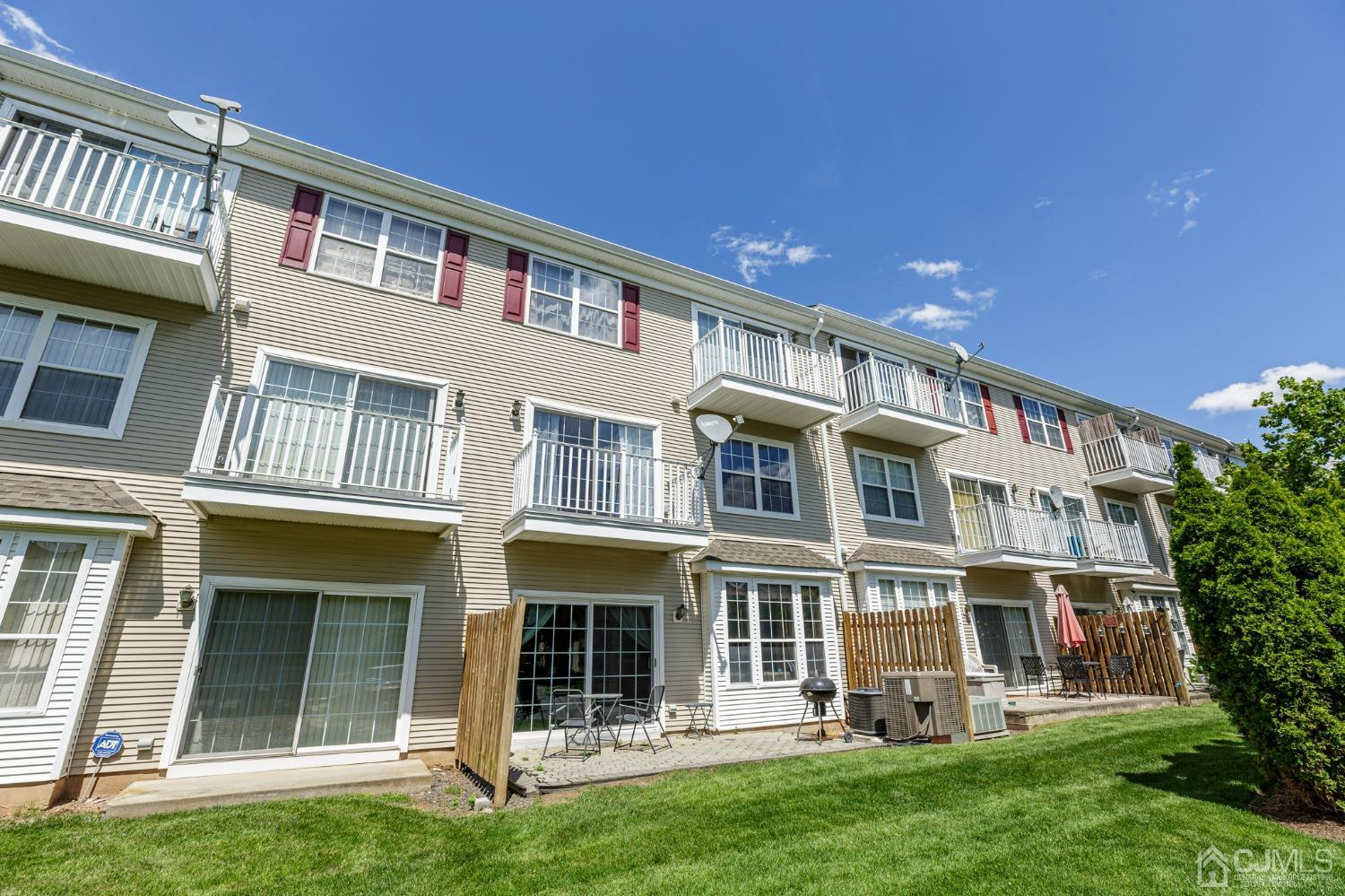 307 Lilac Drive Union, NJ 07083 - Photo 23 of 25 a front view of a house with a yard
