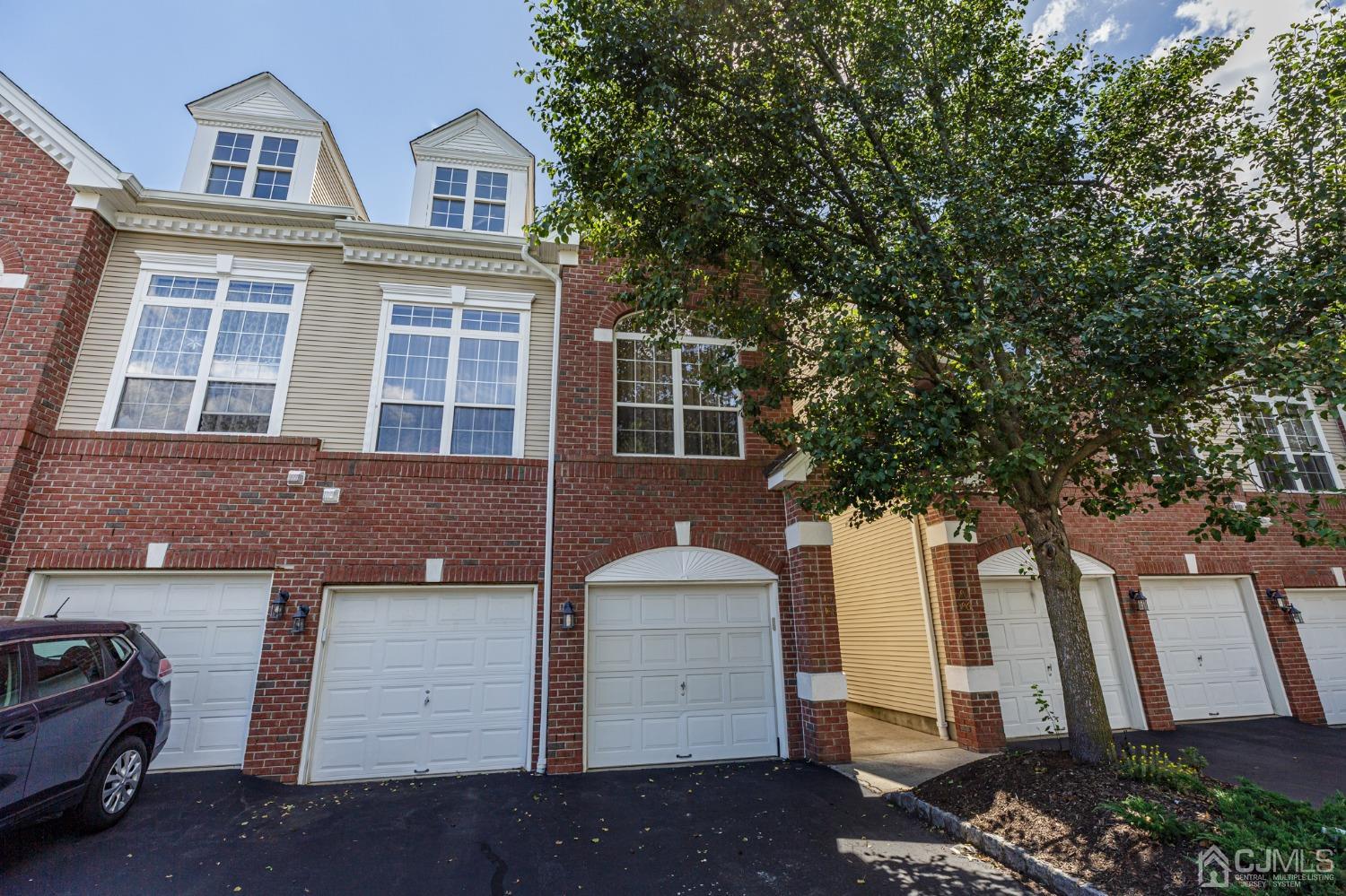307 Lilac Drive Union, NJ 07083 - Photo 24 of 25 a front view of a house with a tree